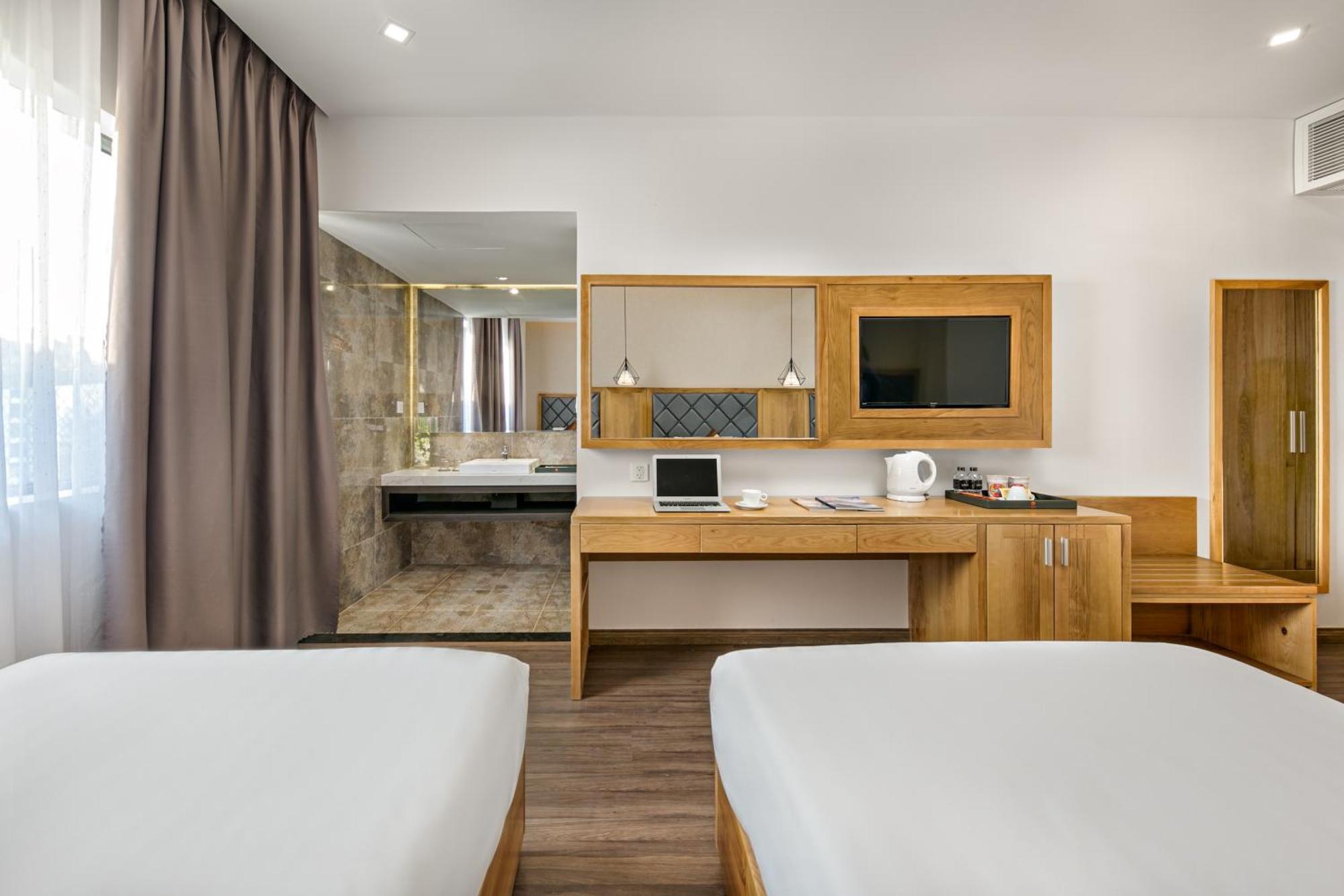Grand Sunrise Boutique Hotel Da Nang Quarto foto